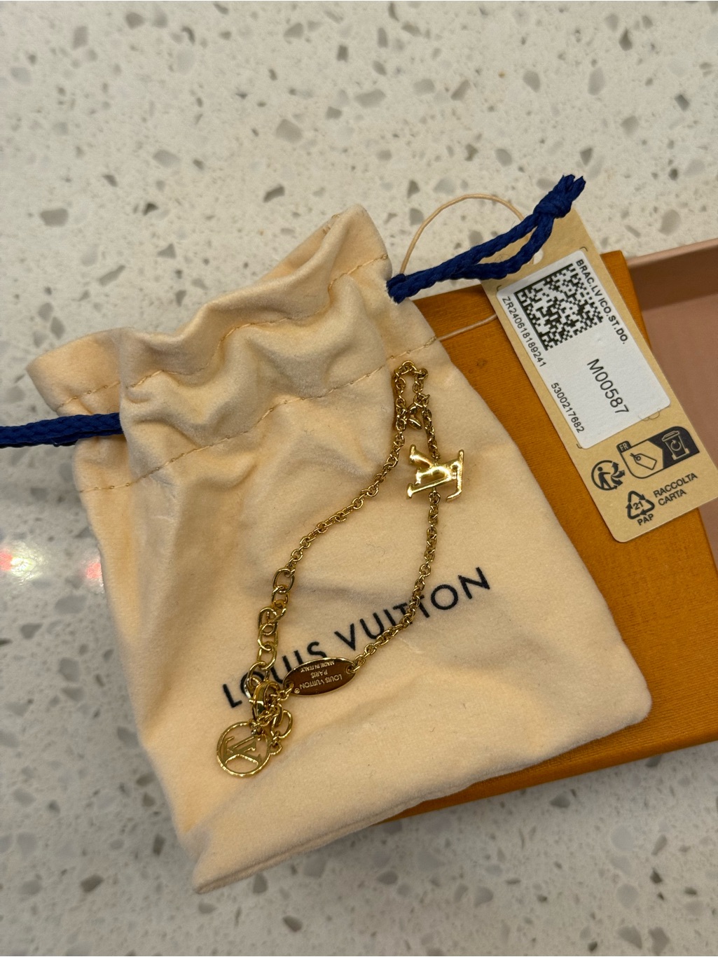 Louis Vuitton Gold Lv Charm Bracelet With Crystal Accents